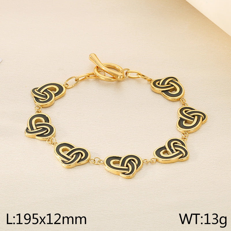Simple temperament, retro oil dripping stainless steel winding heart-shaped OT buckle bracelet, fashionable light luxury, high-end hand jewelry, spot