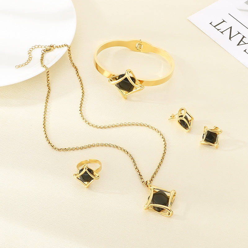 Europe and the United States cross-border new geometric rhombus inlaid stone stainless steel set, high-end light luxury jewelry four-piece set