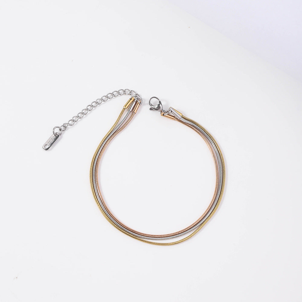 Stainless steel three-color round snake bracelet women's European and American hot-selling trend fashion furnace 18K vacuum electroplated titanium steel bracelet