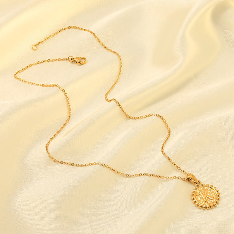 Cross-border hot-selling titanium steel necklace strip does not fade 18k gold-plated A-Z letter chain pendant fashionable couple gift