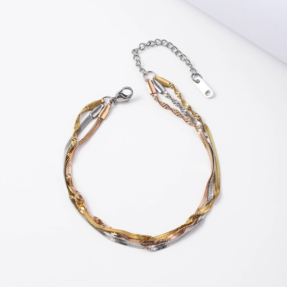 Stainless steel twist push tight bracelet women's European and American trend fashion furnace 18K vacuum plating titanium steel bracelet wholesale