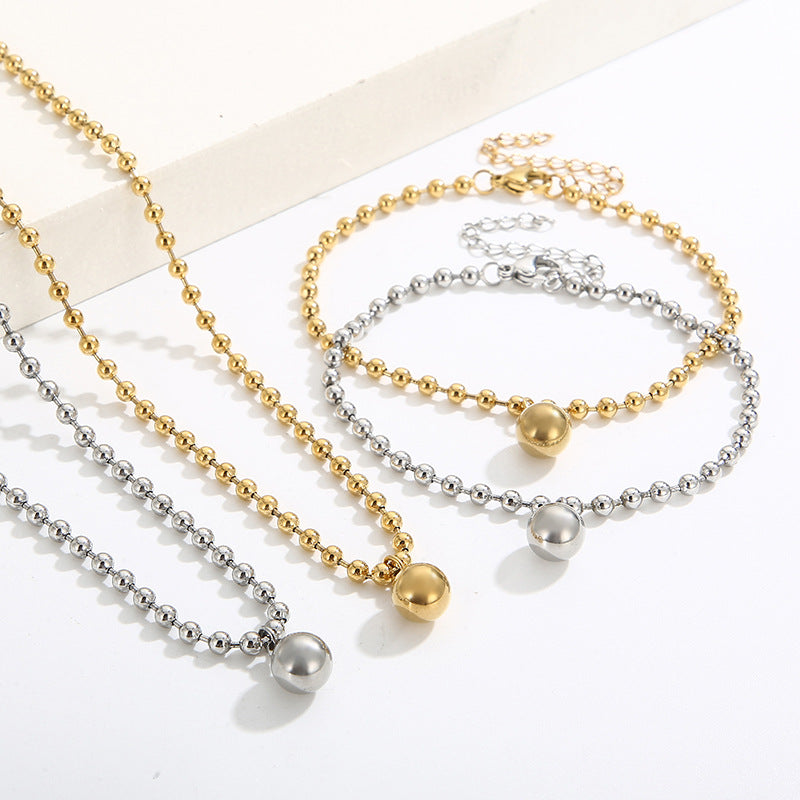 European and American fashion personalized stainless steel 18K gold-plated hollow ball gold bead necklace bracelet set, free jewelry