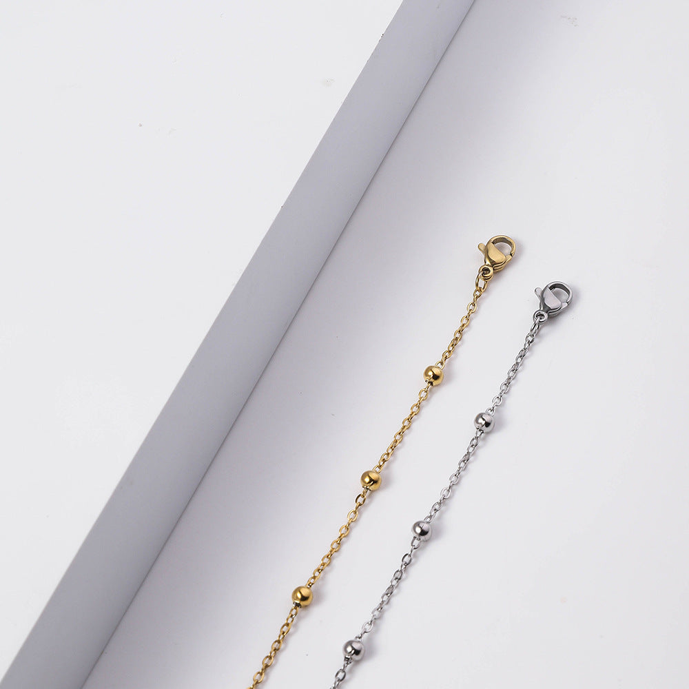 Cross-border hot-selling stainless steel cross bead necklace women's 18K vacuum electroplated gold, simple clavicle titanium steel necklace