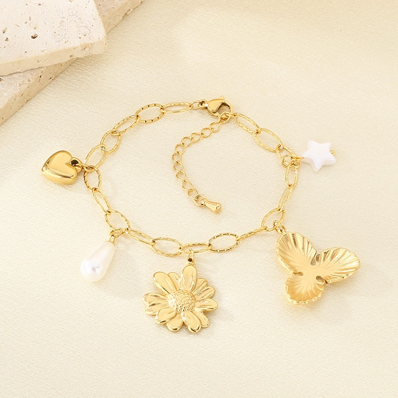 Cross-border new jewelry stainless steel accessories jewelry women's high-end flower angel doll cross pendant matching