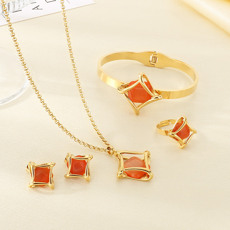 Europe and the United States cross-border new geometric rhombus inlaid stone stainless steel set, high-end light luxury jewelry four-piece set