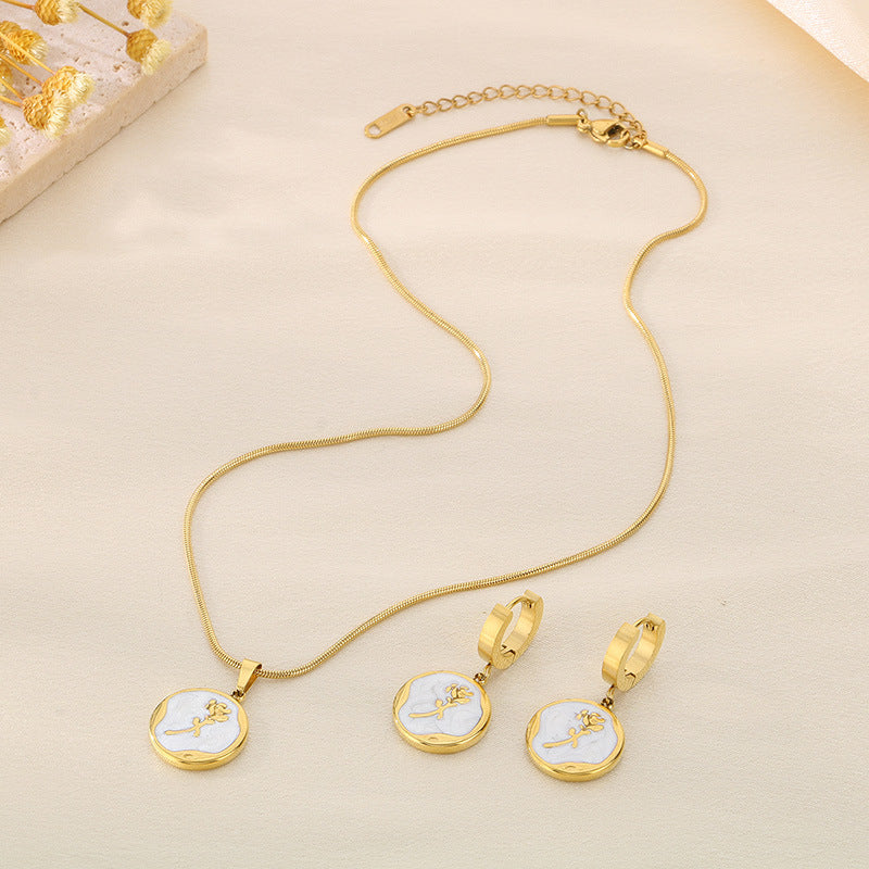 Cross-border fashion pattern butterfly rose pendant three-dimensional stainless steel collarbone chain black and white round drop ear buckle set