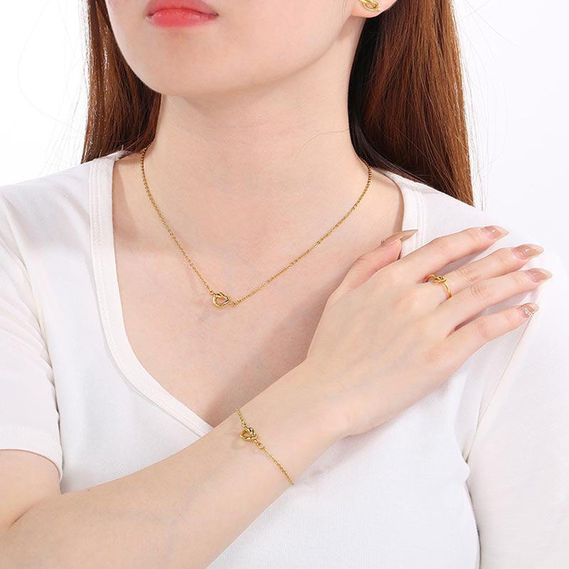 Cross-border fashion versatile rope knot elements stainless steel stud earrings necklace bracelet four-piece set knotted collarbone chain spot