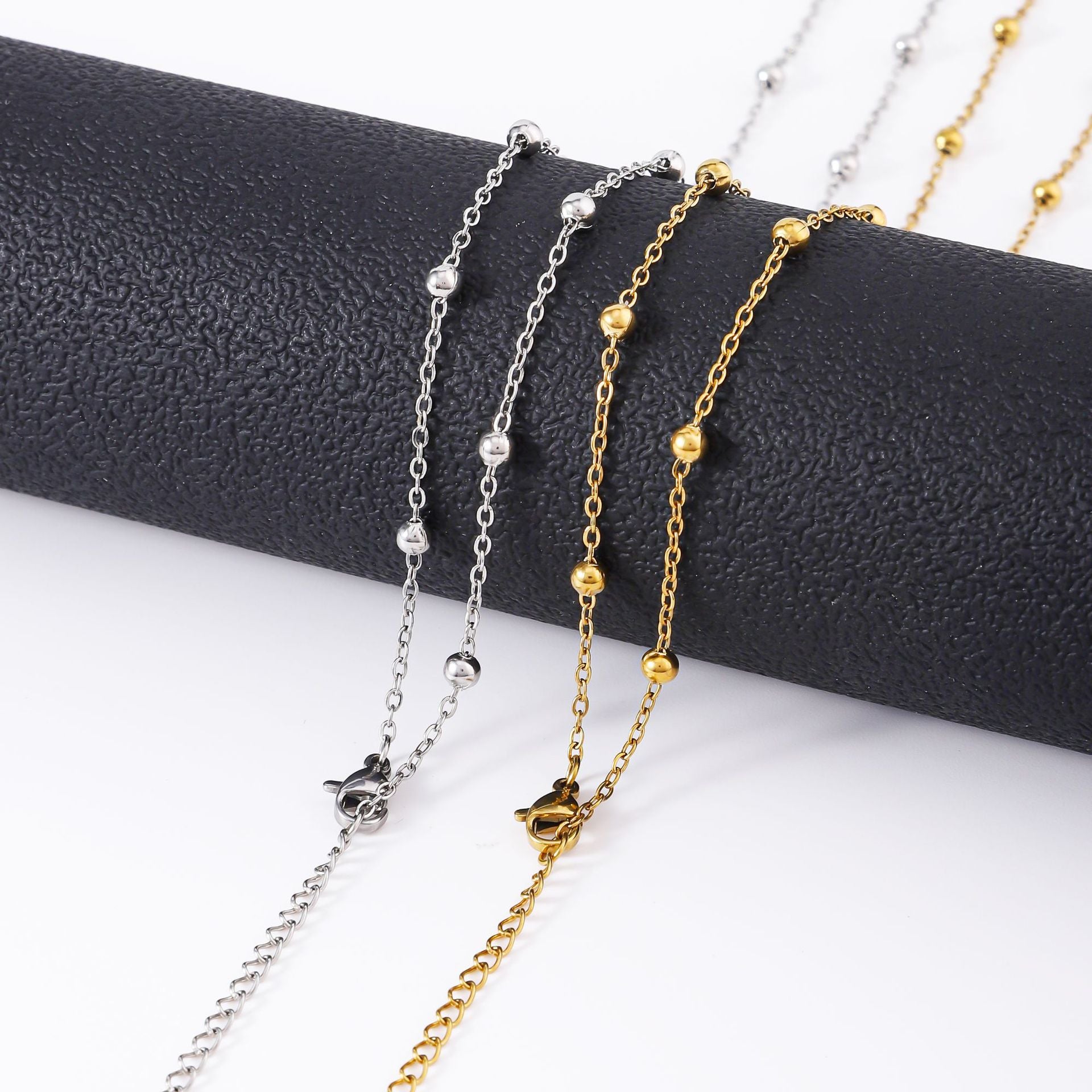 Cross-border hot-selling stainless steel cross bead necklace women's 18K vacuum electroplated gold, simple clavicle titanium steel necklace