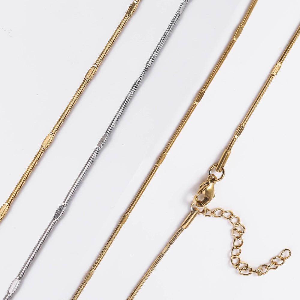 Cross-border hot sale stainless steel round snake embossed chain 18K real gold electroplated titanium steel necklace fashion snake bone chain female plain chain