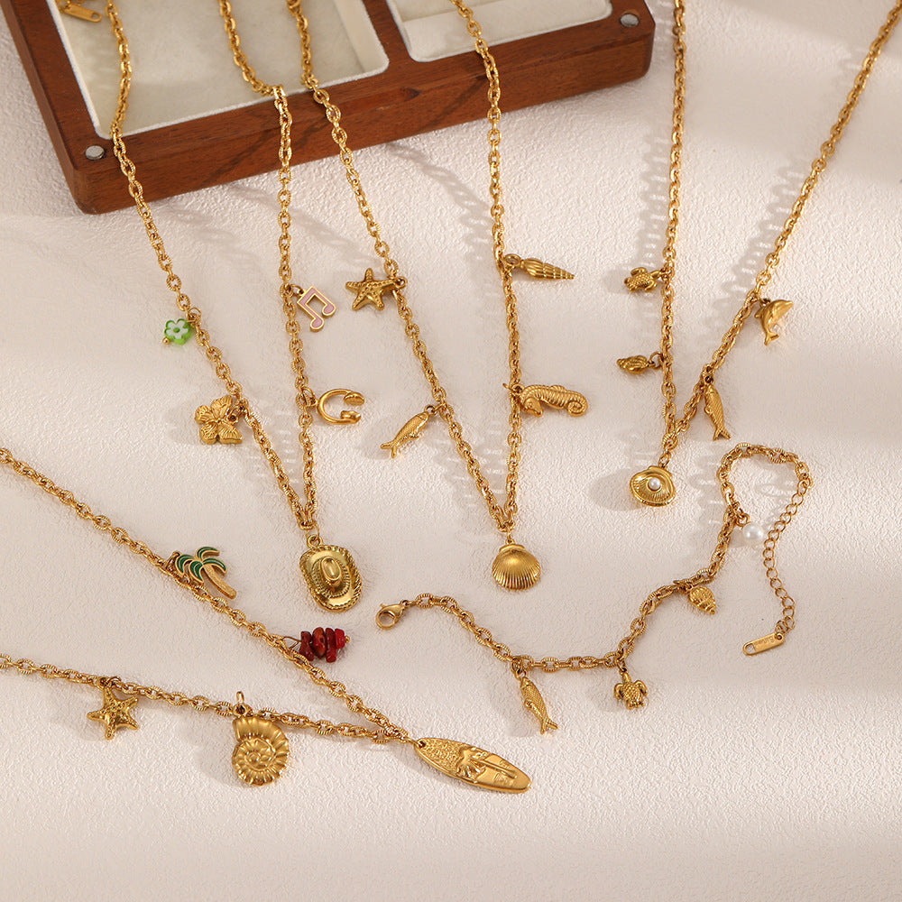 Cross-border European and American ocean starfish pendant, conch necklace, women's versatile light luxury stainless steel plated 18K gold-plated collarbone chain