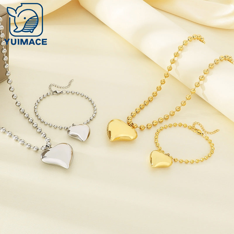 Cross-border fashion stainless steel love pendant jewelry simple titanium steel round bead neck chain bracelet versatile jewelry two-piece set