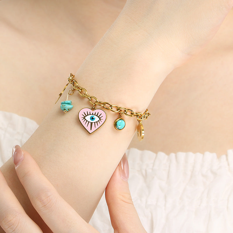 Cross-border fashion personality dripping pink stainless steel love devil eye blue turquoise pendant palm chain bracelet
