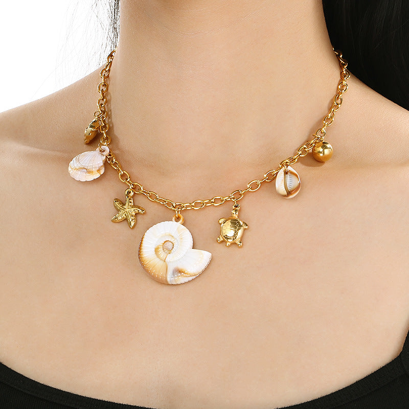 Gold Seashell & Dolphin Charm Necklace
