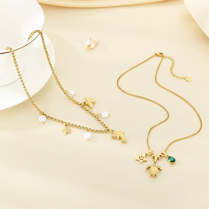 Gold Layered Charm Necklace with Pearl & Symbol Pendants