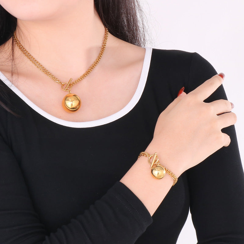 Cross-border versatile ball hollow pendant bracelet necklace set, niche design high-end simple versatile jewelry