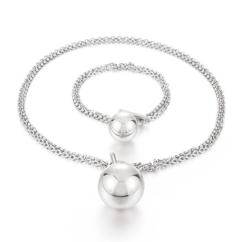 Cross-border versatile ball hollow pendant bracelet necklace set, niche design high-end simple versatile jewelry