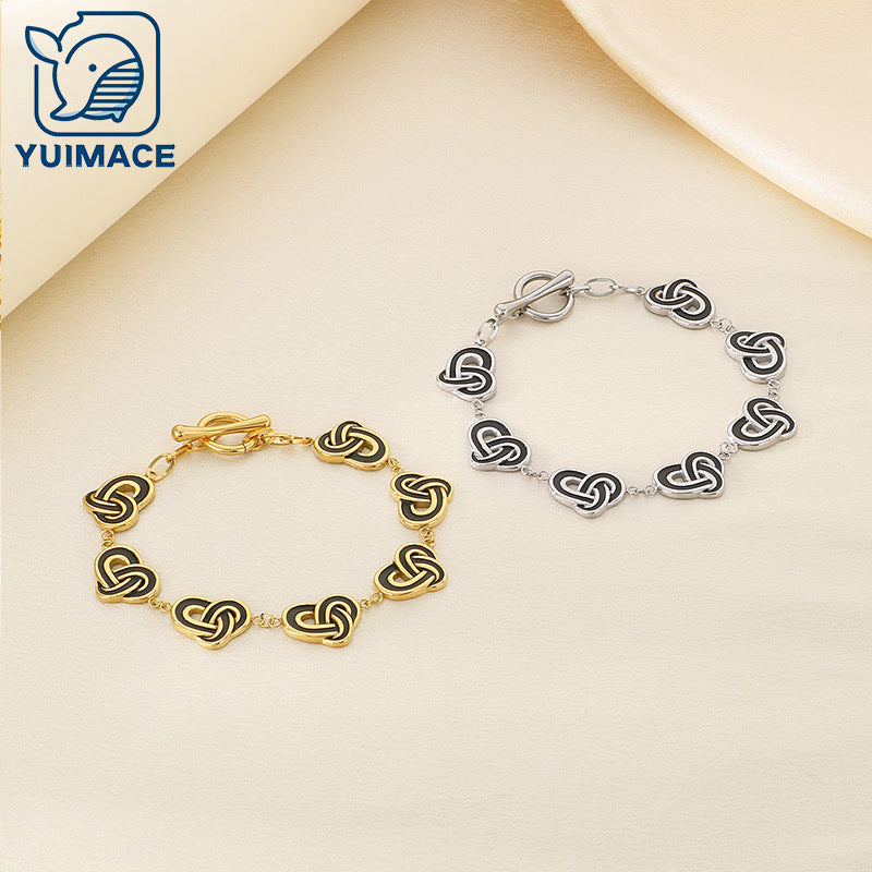 Simple temperament, retro oil dripping stainless steel winding heart-shaped OT buckle bracelet, fashionable light luxury, high-end hand jewelry, spot