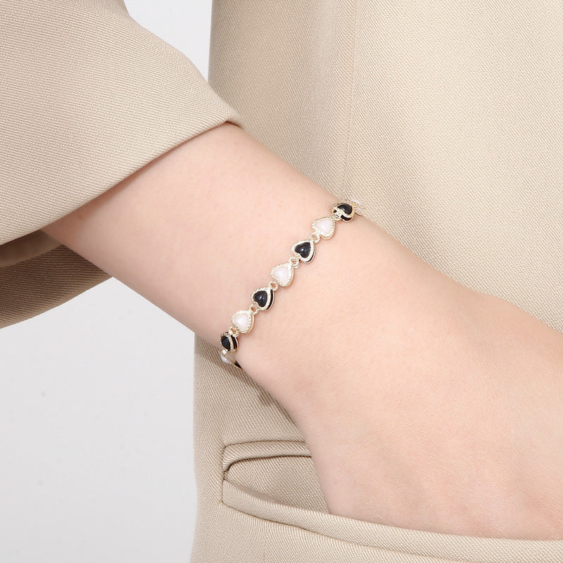 Fresh one-piece love pearl copper bracelet, simple and cold wind design stainless steel splicing bracelet