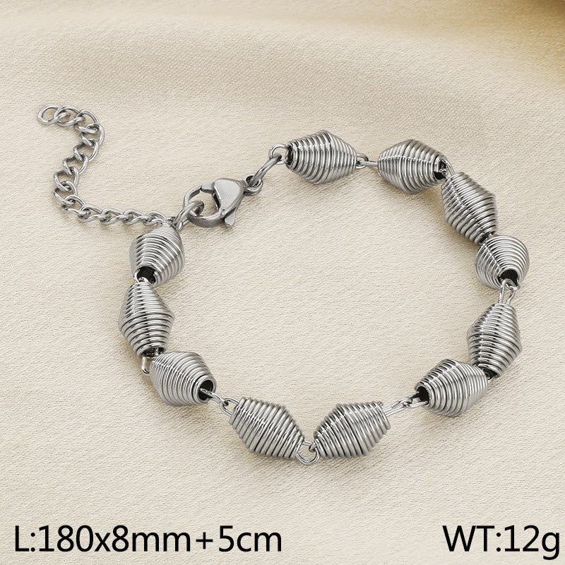 The new titanium steel bracelet is plated with 18K gold titanium steel geometric threaded bracelet, simple style, non-fading bracelet jewelry.