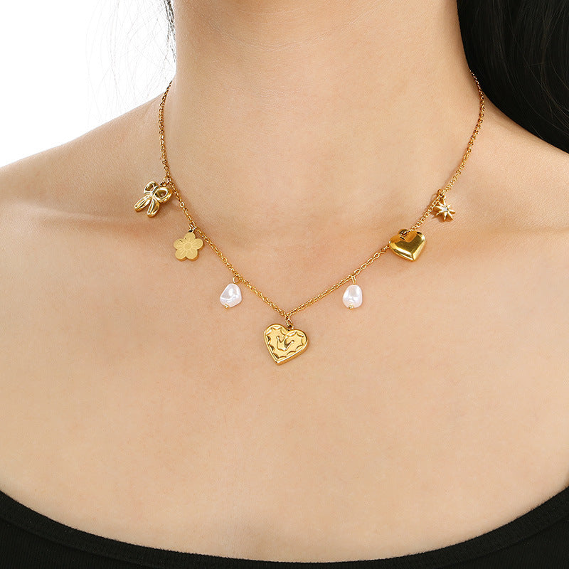 Cross-border European and American stainless steel love necklace high-end pendant niche design bow collarbone chain titanium steel jewelry