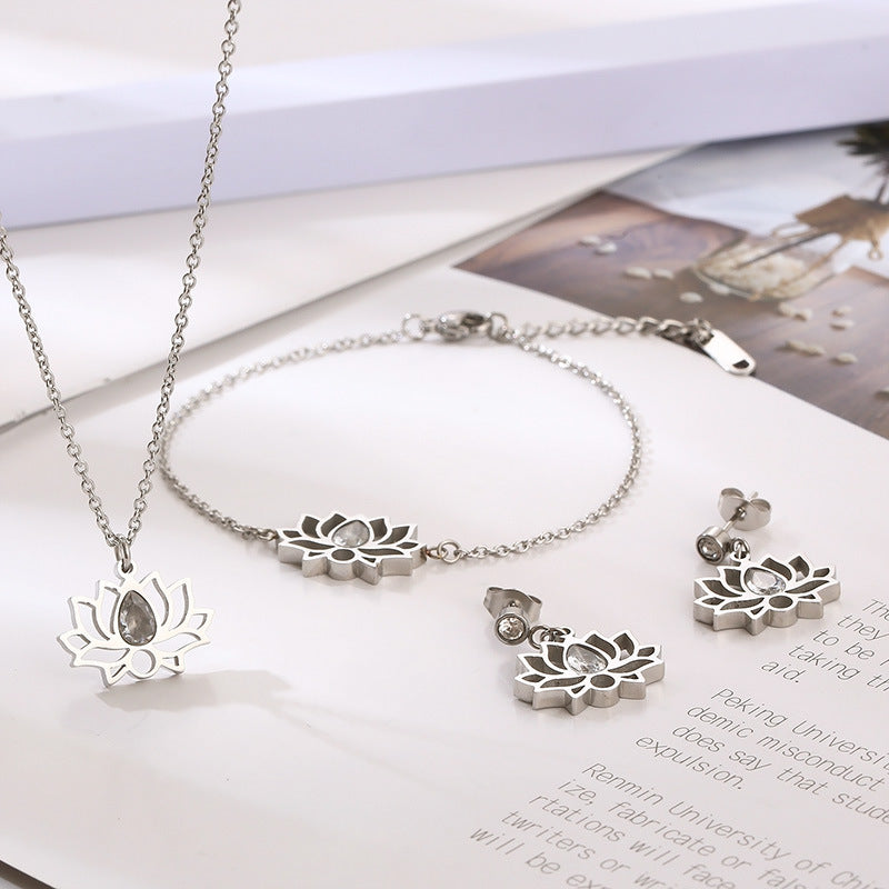 Cross-border new stainless steel zircon lotus set, creative hollow flower water drop stone pendant jewelry three-piece set