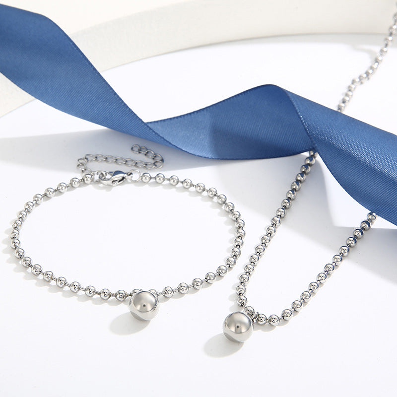 European and American fashion personalized stainless steel 18K gold-plated hollow ball gold bead necklace bracelet set, free jewelry