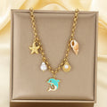 Gold Seashell & Dolphin Charm Necklace