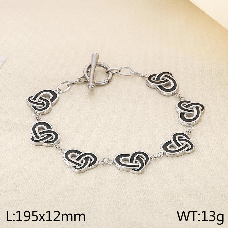 Simple temperament, retro oil dripping stainless steel winding heart-shaped OT buckle bracelet, fashionable light luxury, high-end hand jewelry, spot