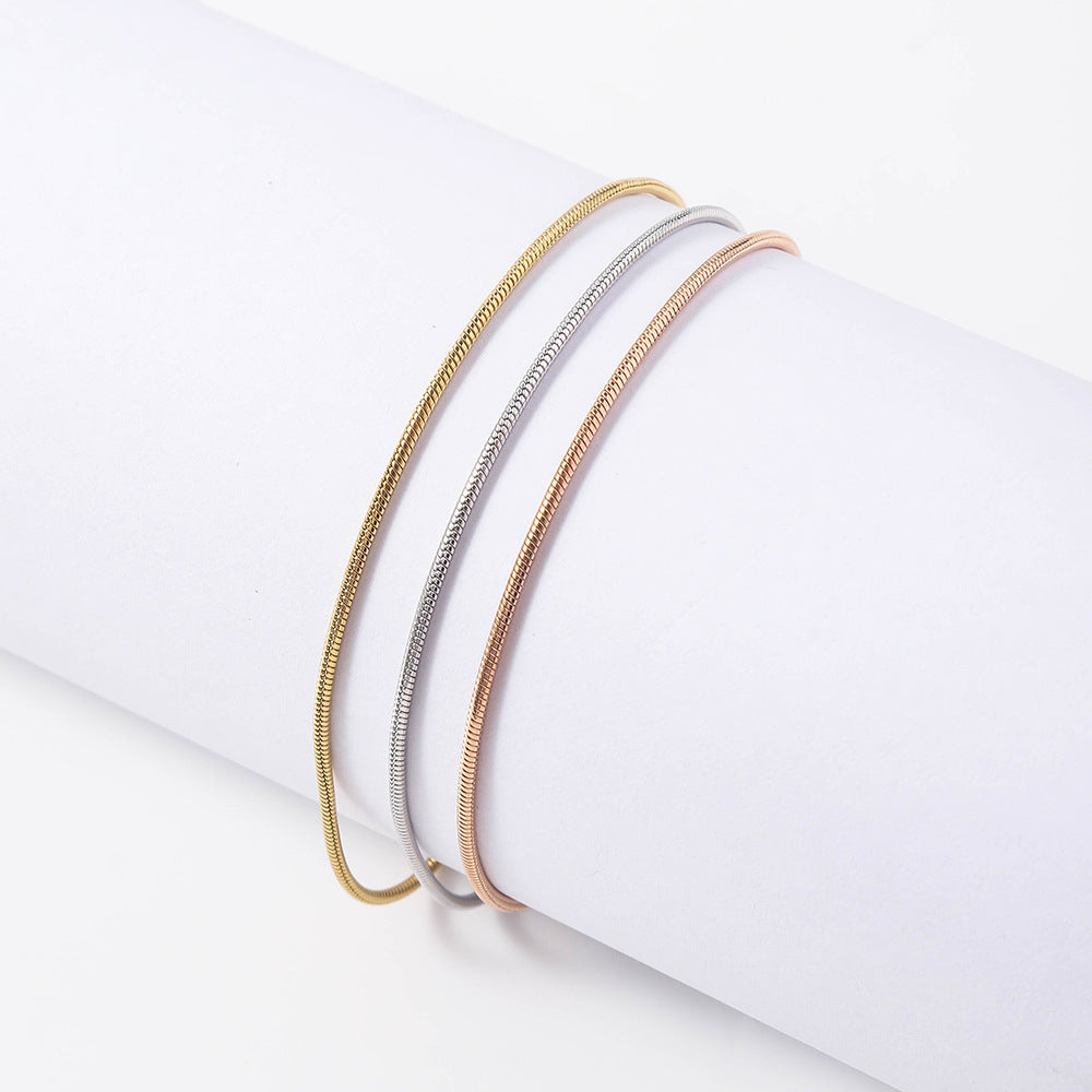 Stainless steel three-color round snake bracelet women's European and American hot-selling trend fashion furnace 18K vacuum electroplated titanium steel bracelet