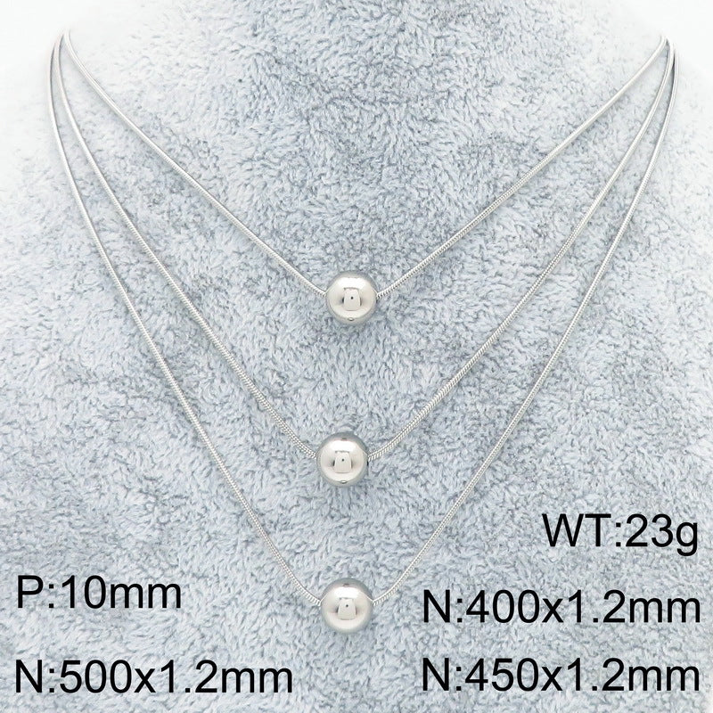 Cold wind high-grade titanium steel three-layer stacking wearing wind comes and goes round beads pearl titanium steel snake bone chain necklace necklace item decoration