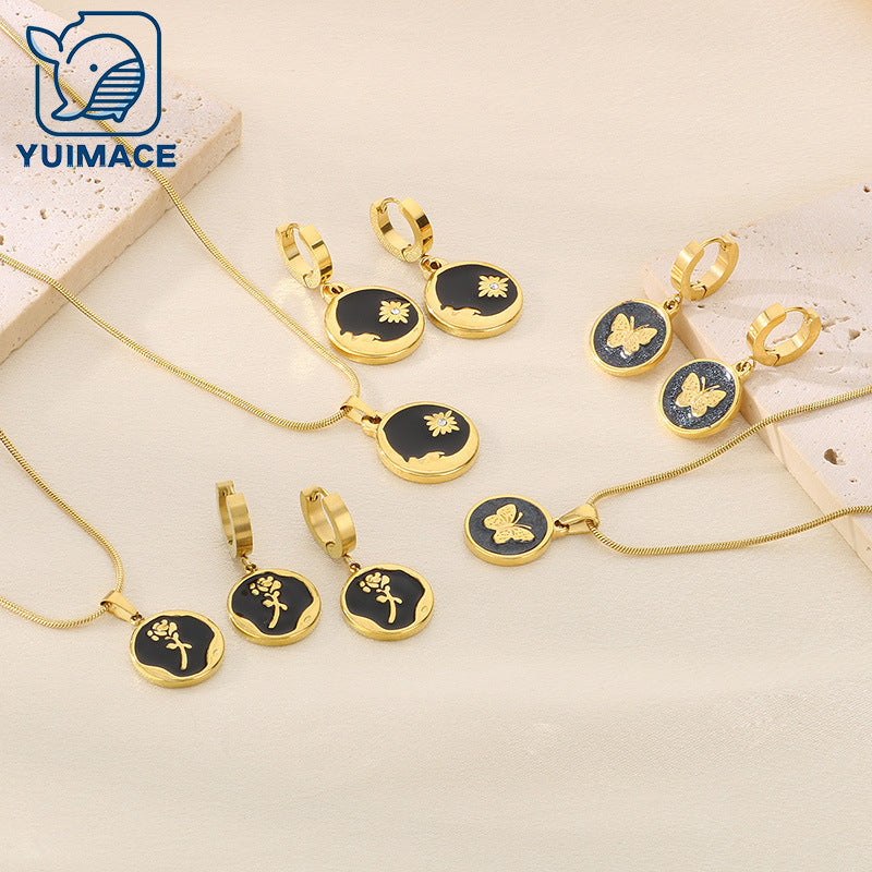 Cross-border fashion pattern butterfly rose pendant three-dimensional stainless steel collarbone chain black and white round drop ear buckle set