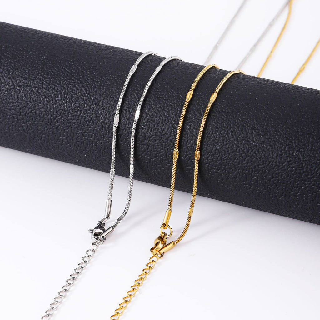 Cross-border hot sale stainless steel round snake embossed chain 18K real gold electroplated titanium steel necklace fashion snake bone chain female plain chain