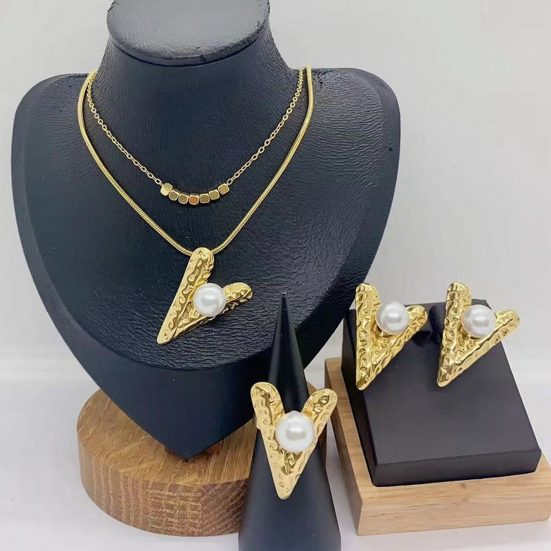 Amazon cross-border stainless steel set women's jewelry inlaid with pearl turquoise love pendant four-piece jewelry