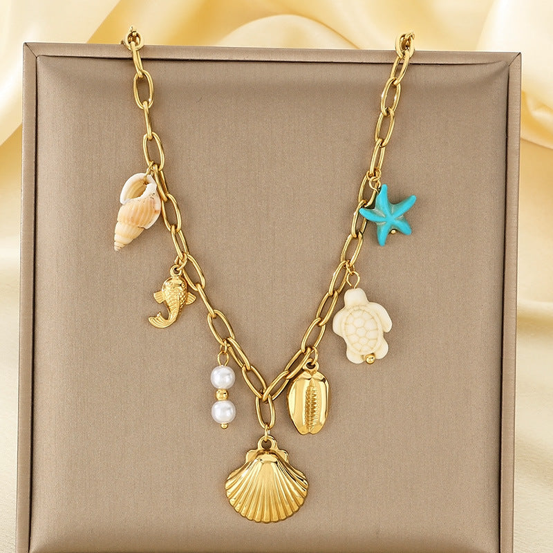 Gold Seashell & Dolphin Charm Necklace