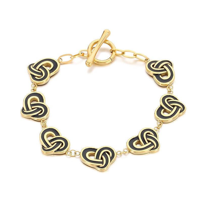 Simple temperament, retro oil dripping stainless steel winding heart-shaped OT buckle bracelet, fashionable light luxury, high-end hand jewelry, spot
