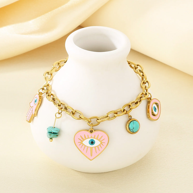 Cross-border fashion personality dripping pink stainless steel love devil eye blue turquoise pendant palm chain bracelet