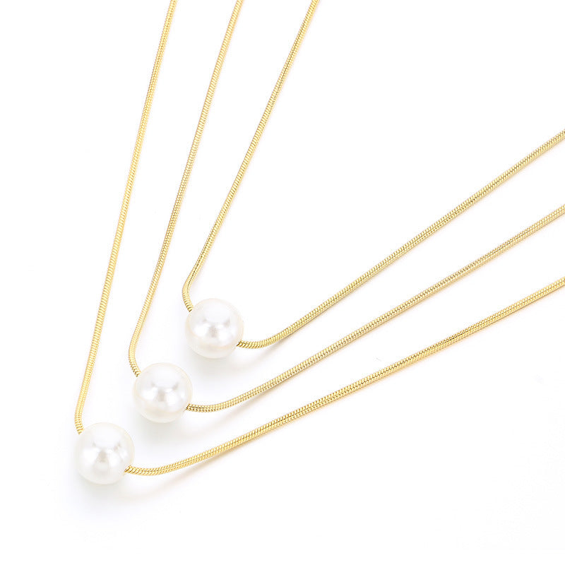 Cold wind high-grade titanium steel three-layer stacking wearing wind comes and goes round beads pearl titanium steel snake bone chain necklace necklace item decoration